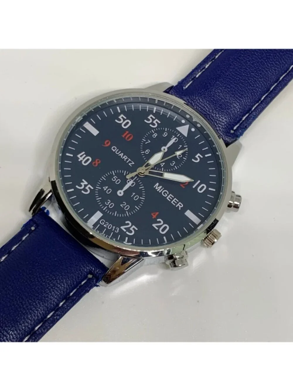 MiGEER men’s quartz analog watch 42mm silver tone blue dial leather running